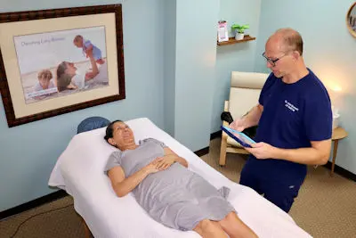 John treating a patient