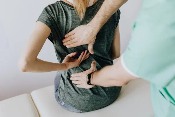 Woman being treated on her back